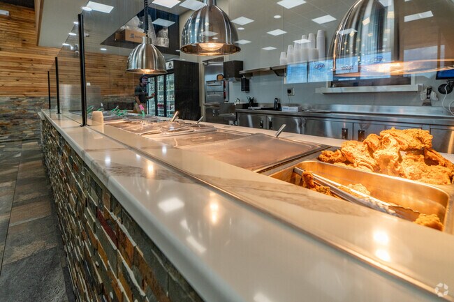 Enjoy hearty portions and rich flavors at Nana Morrison's Soul Food in Tulip Park.