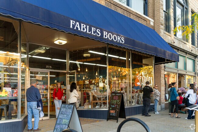 Benton residents gather with a local at Fables Books.