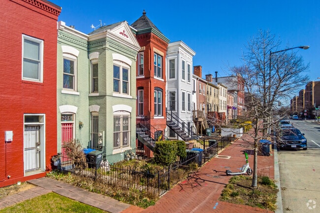 Some row homes in Capitol Hill feature small fenced-in gardens.