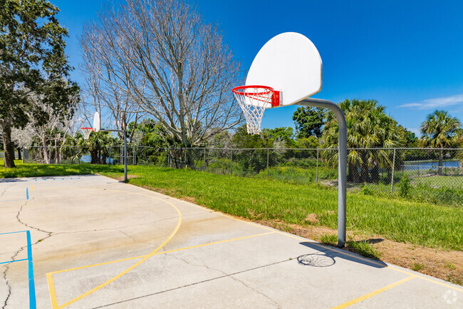 Students enjoy outdoor play on the sports courts at Sunset Hills Elementary School.
