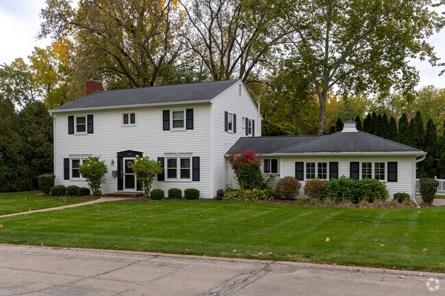 This Blackhawk colonial home boasts a large yard and immaculate landscaping.