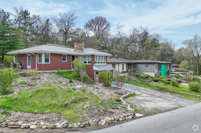 Rows of unique homes sit on the hilly roads of the Ogden Dunes.
