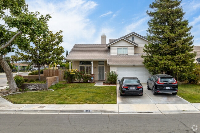 A stunning single-family home in Valley View with beautiful landscaping.