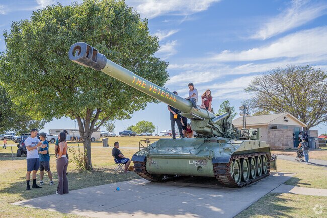 The tank at Elmer Thomas Park is a favorite climbing spot for kids.