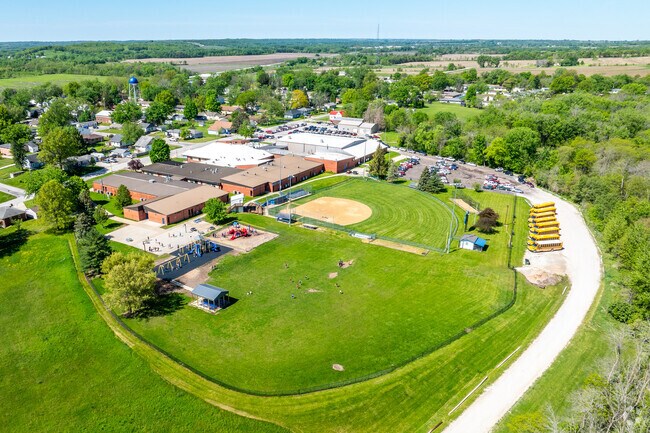 The campus features a softball field, with the football field being just down the street.