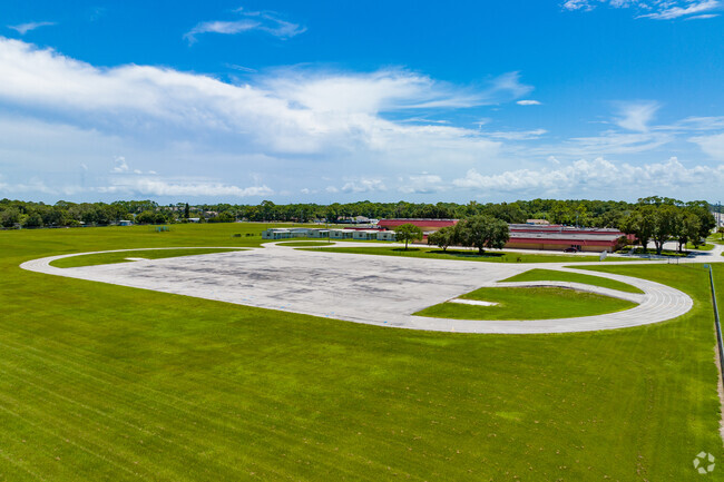 John F. Kennedy Middle School has a large parking lot on the west side of the school.
