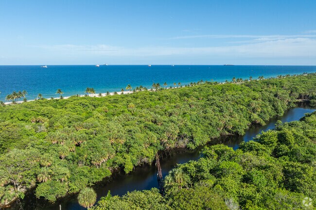 Discover diverse ecosystems at Hugh Taylor Birch State Park near Nurmi Isles.