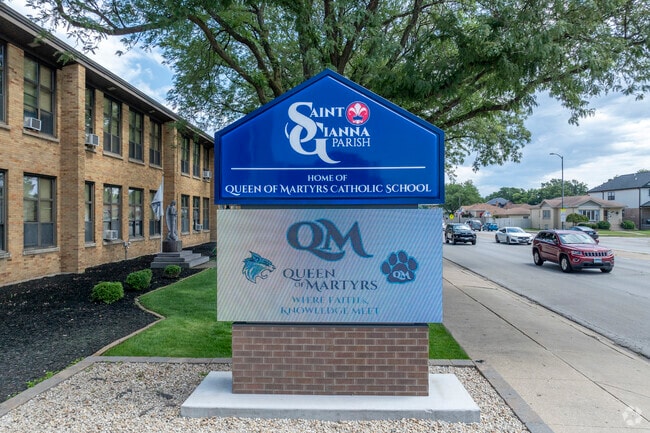 Queen of Martyrs Catholic School has 241 students.