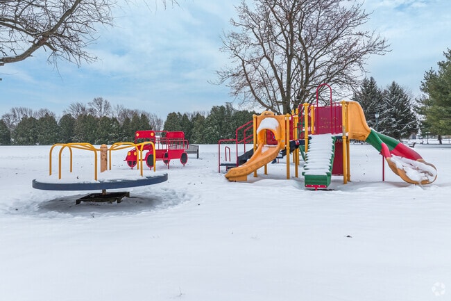 Cast Park has a colorful playground, a large open field, a sledding hill, and a pond.