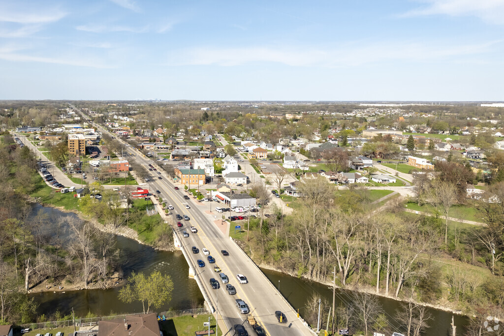The Huron River flows on the shores of Downtown Flat Rock.