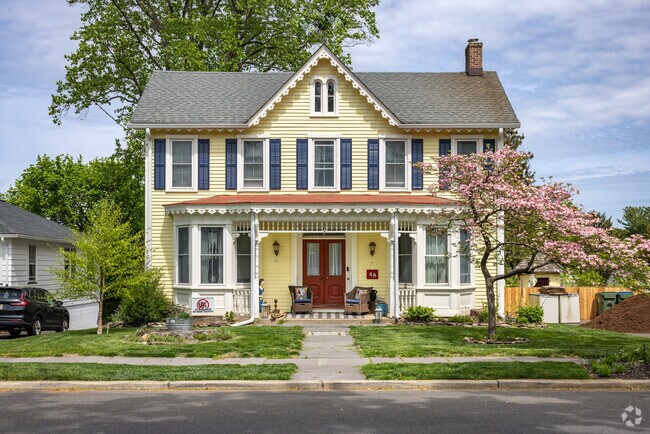 Colorful porch trim and playful, asymmetrical design characterizes the more ornate Victorian designs in Bloomsbury.
