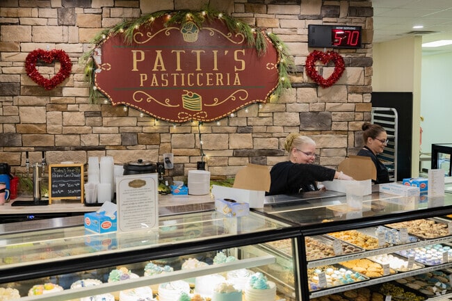 Residents enjoy donuts, cakes, and cookies at Patti's Pasticceria in White Oak.