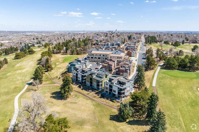 Townhomes near Willis Case Golf Course boast rooftop decks and mountain views.