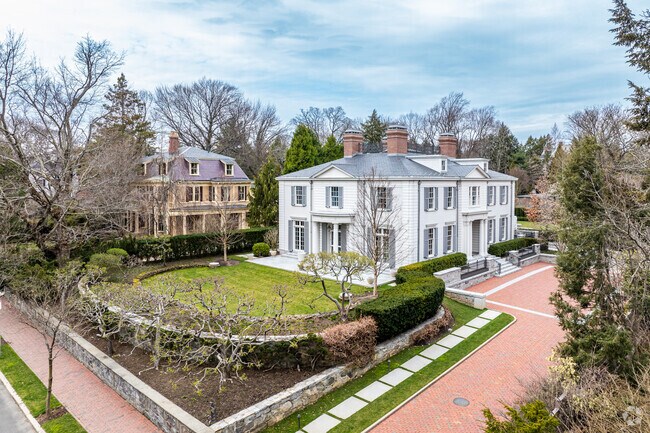 A group of large Colonial inspired homes in West Cambridge.