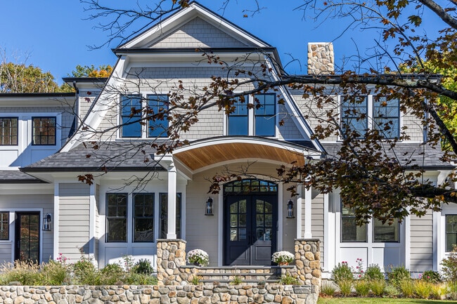 Homes in Countryside include modern colonials with big window and private multi-car garage.