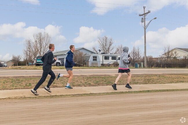 Douglas High School track team runs after school in Box Elder.