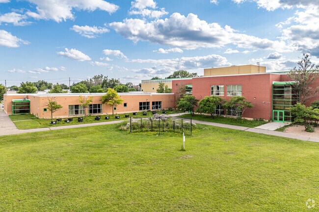 Crossroads Montessori School features a large greenspace for student activities.