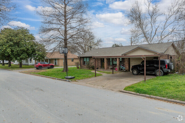 A row of ranch style homes sit along a quiet street in central Galena Park.