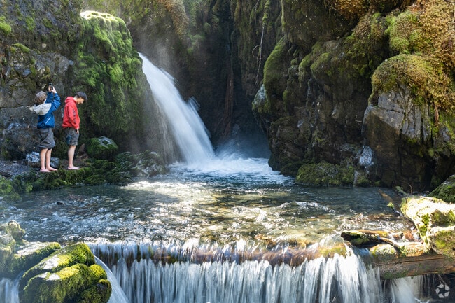 Alyeska boys take in the ionizing spray at Virgin Creek Falls.