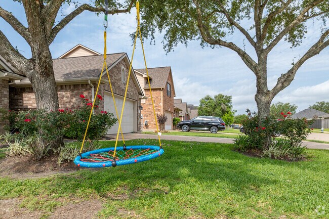 Families of The Lakes at Highland Glen love to play in the front yard in the warm Texas evenings.