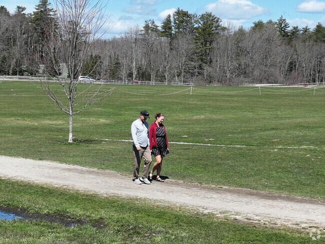 A couple takes a walk in Cumberland Center.