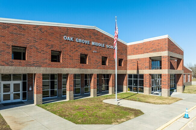 Visitors are greeted by Oak Grove Middle School's warm and inviting entrance.