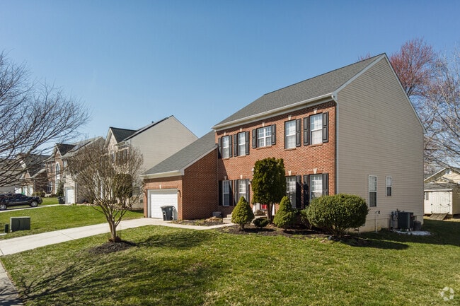 Well-manicured lawns are a frequent sight in the Clinton neighborhood.