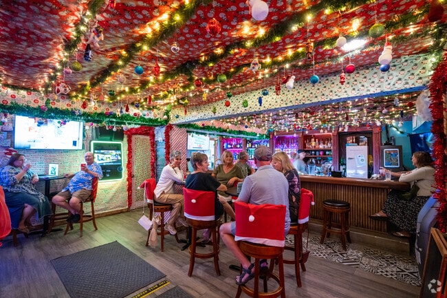 Upper Deck Hotel & Bar is a hidden gem bar located in central South Padre Island along E Atol St.