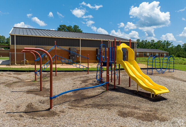 Poplar Road Elementary School has multiple playgrounds.