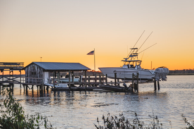 Enjoy a private dock for your boat with scenic views of the Waccamaw River in Georgetown.