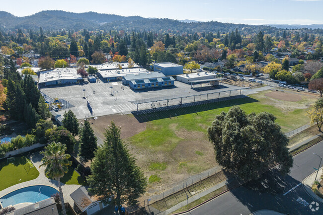 Walnut Acres Elementary School has a large field and green space.