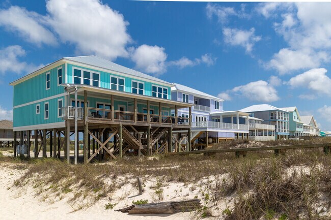 Larger beach homes in Fort Morgan, Alabama are built in a coastal contemporary style.