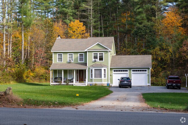 Single family homes in West Hollis, NH commonly have long driveways and multi-car garages.