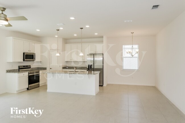 1570 Isleta Lp, Kissimmee, FL 34741 - photo 4