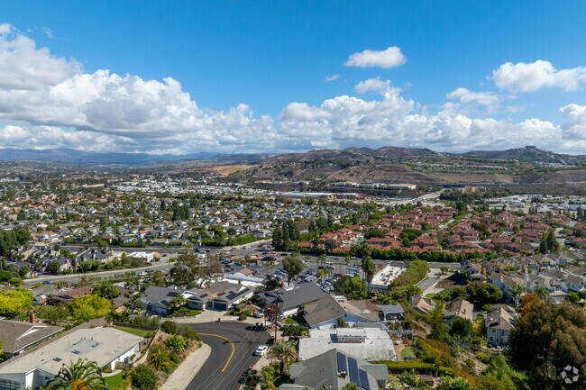 Homes range from mid-century ranch-style houses to modern estates, many with spacious yards, ocean-view lots, and architectural charm that reflects the neighborhood’s upscale coastal vibe.