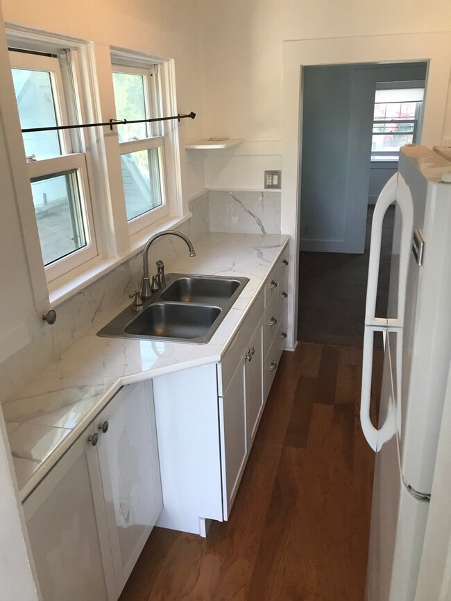 Kitchen w/ new cabinets and stove