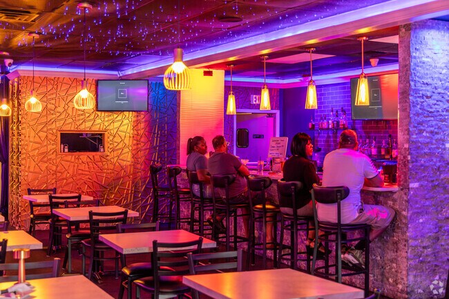 Stop by Sea Bar II for seafood options and drinks in a trendy atmosphere.