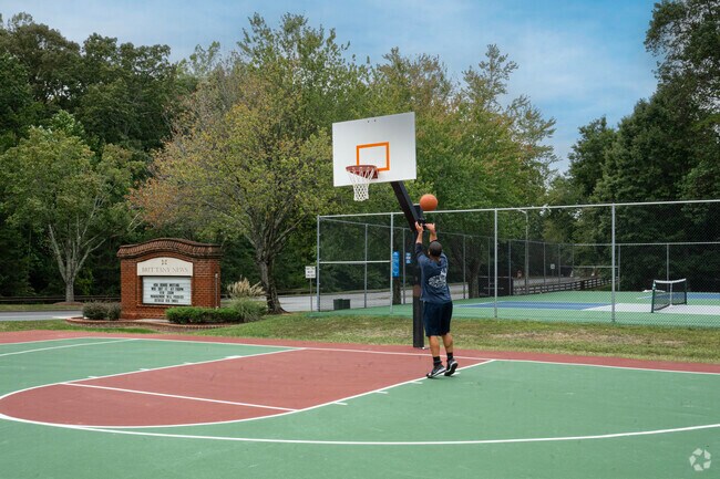 Shoot hoops at the basketball courts at Brittany Neighborhood Park in Four Seasons.