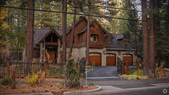 Iconic A frame homes with stone facades and three car garages in Incline Village.