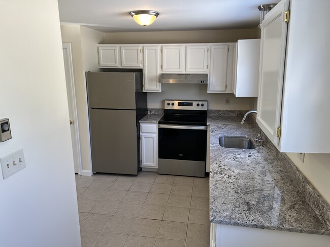 NEW! Granite countertops & stainless appliances. Fresh paint & fixtures