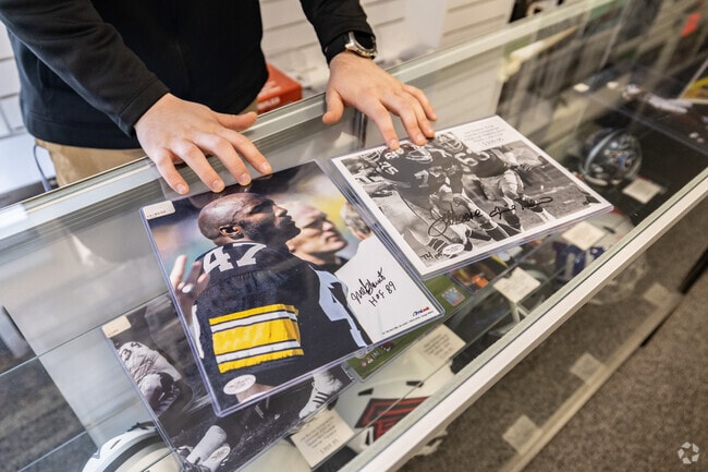 White Oak residents shop for the latest sports card releases at Steel City Collectables.