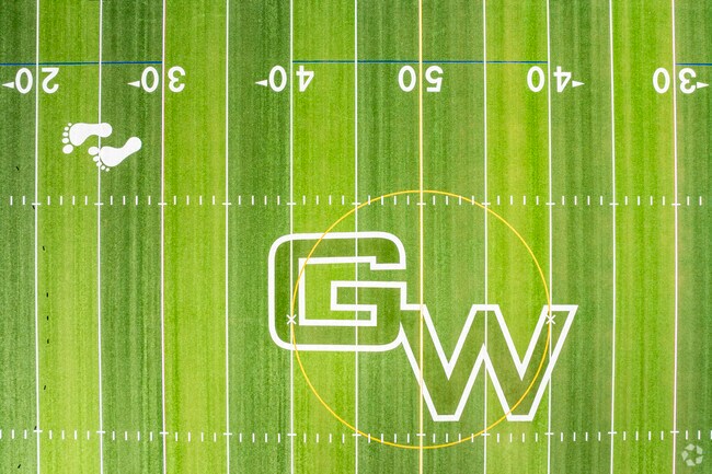 In Montclair, Denver, CO, the local High School football field freshly cut for the coming season