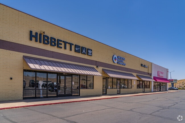 Hibbett Sports and adjacent retail shops offer clothing, footwear, and athletic gear in a shopping center just off the highway in Central Heights-Midland City.
