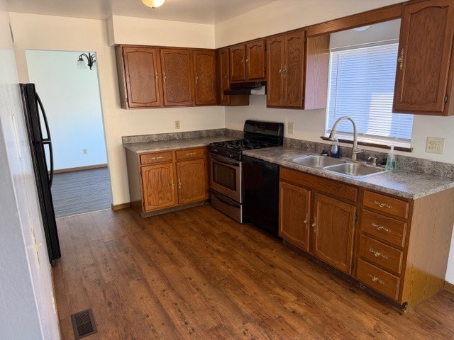 Kitchen includes stove, refrigerator and dishwasher