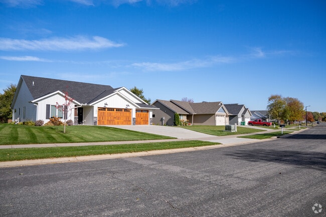 Saint Augusta homes often feature long driveways and generous garage space.
