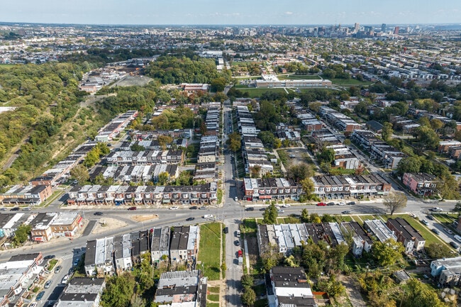 Winchester sits west of downtown Baltimore with early 20th-century row homes.