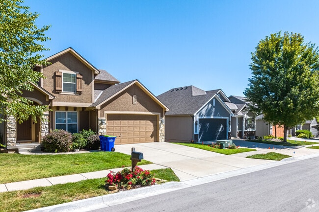 A newer neighborhood in Merriam is filled with 2-3 bedrooms and small plots.