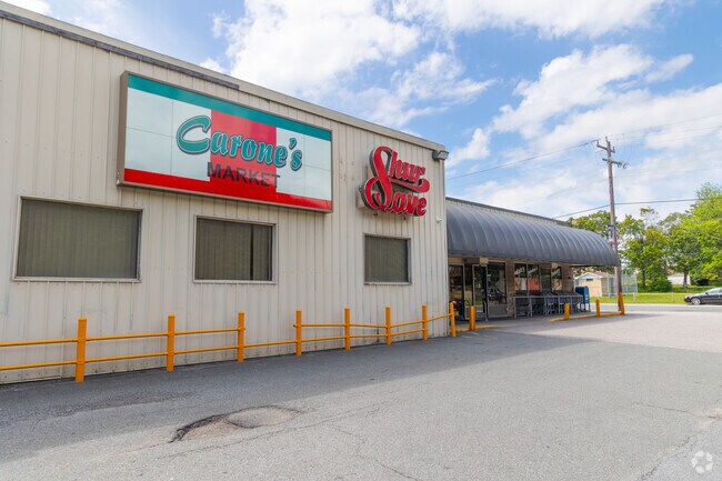 Carone's Market is a full-service grocery store offering an in-house meat department, bakery, and deli making it a central hub for local shopping needs.