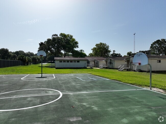 Students at Madison Street Academy enjoy playing basketball during recess in Northwest Ocala.