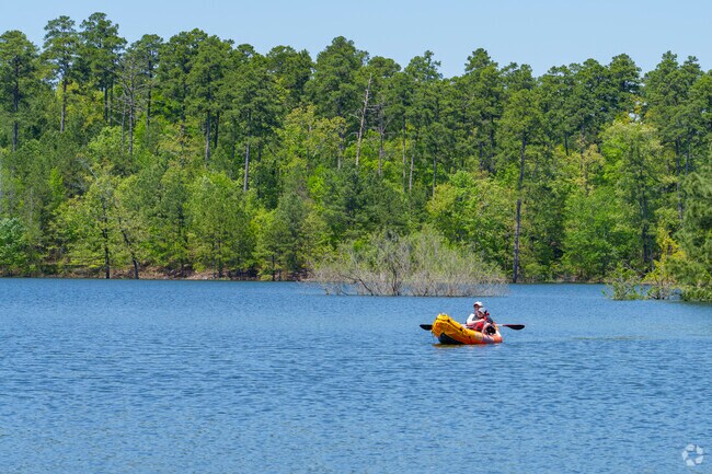 Malvern locals float peacefully on a nearby lake, soaking up the sun and the slower pace of the weekend.